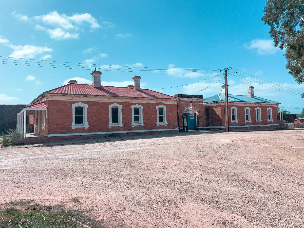 The imposing facade of the old Gladstone Gaol, a stark reminder of days gone by.
