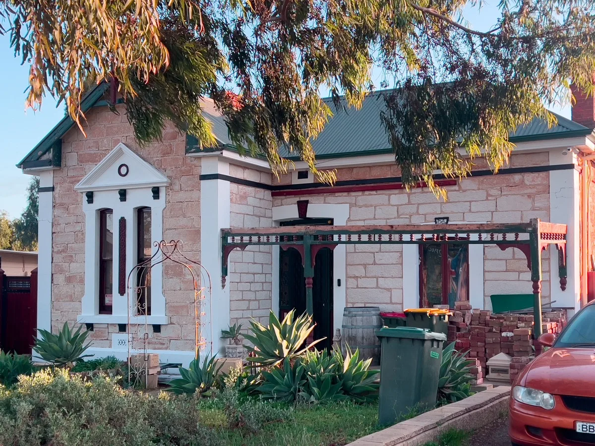 A beautifully maintained stone house, showcasing the architectural character of Hamley Bridge.