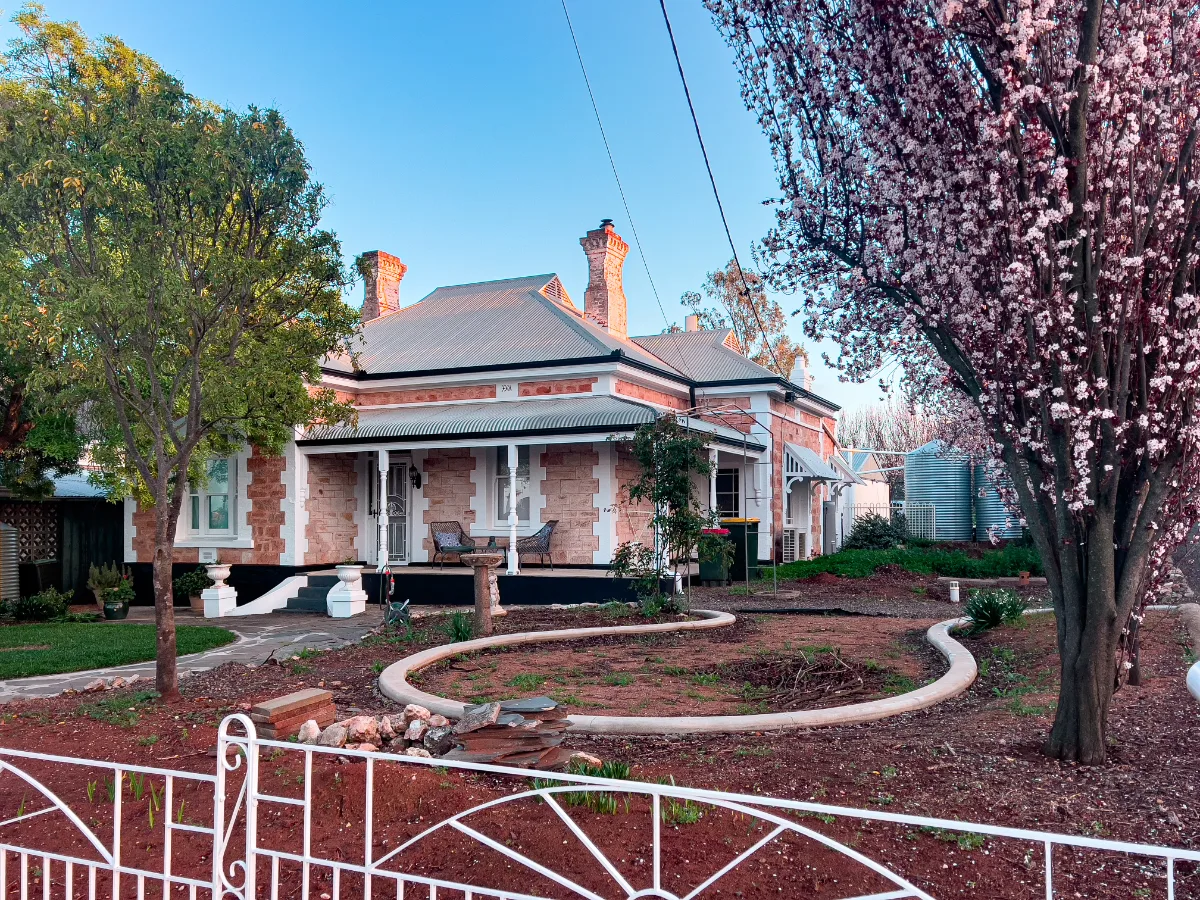 A classic Hamley Bridge home, showcasing the local stone and beautiful landscaping.