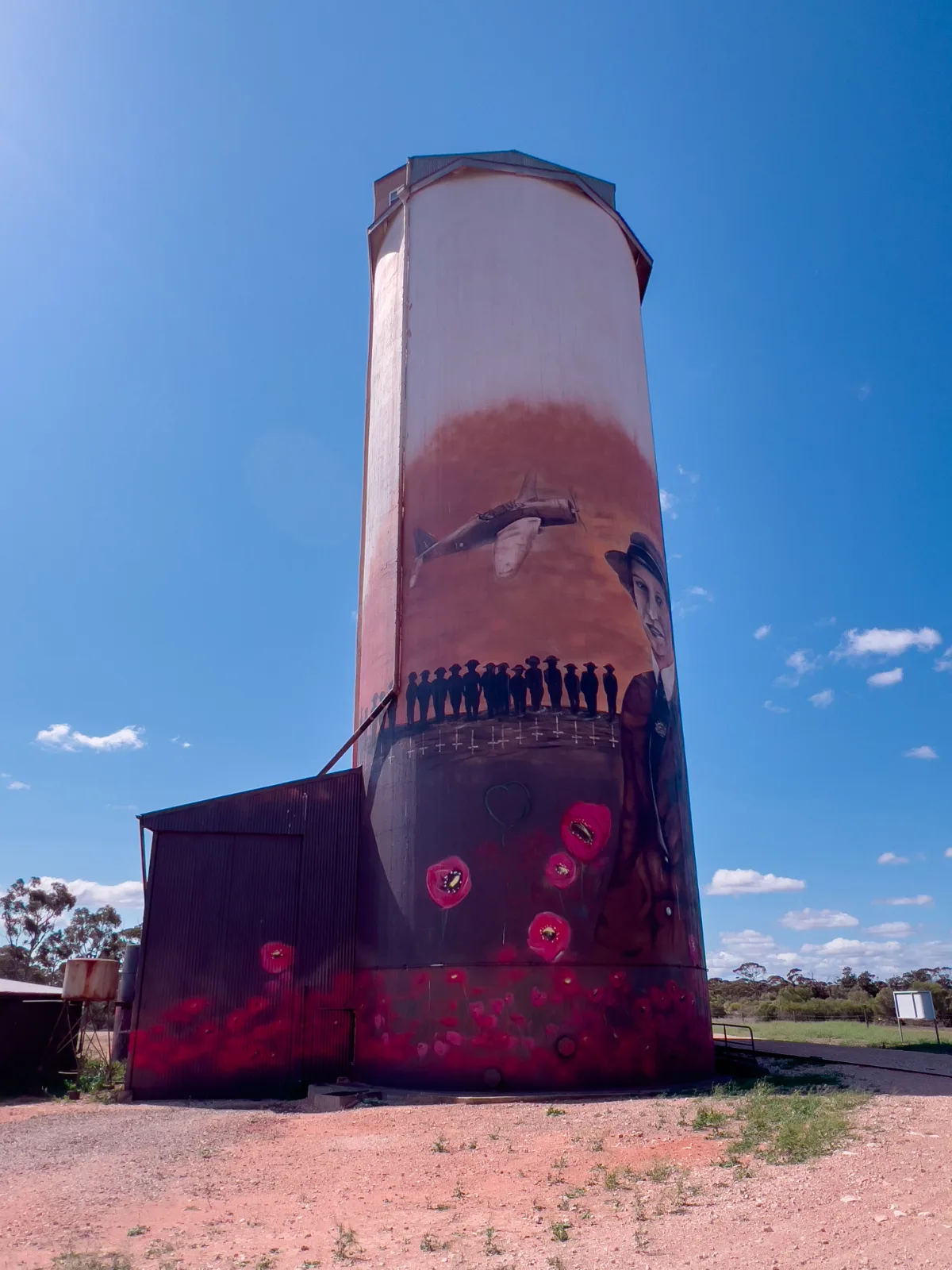 The Galga silos reach for the sky, bearing witness to stories of service and sacrifice rendered in bold strokes and thoughtful detail.