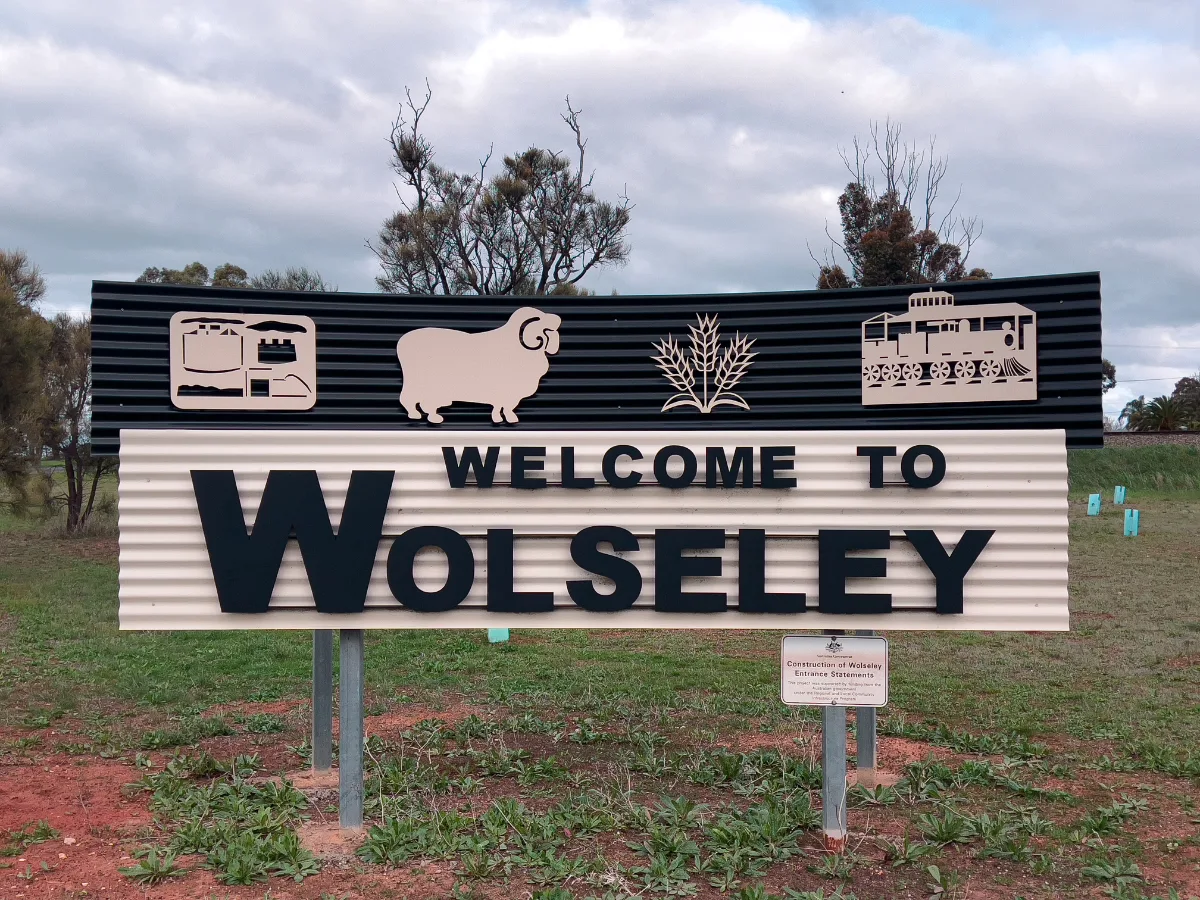 The Wolseley welcome sign, a visual summary of the town's agricultural roots and transport heritage.