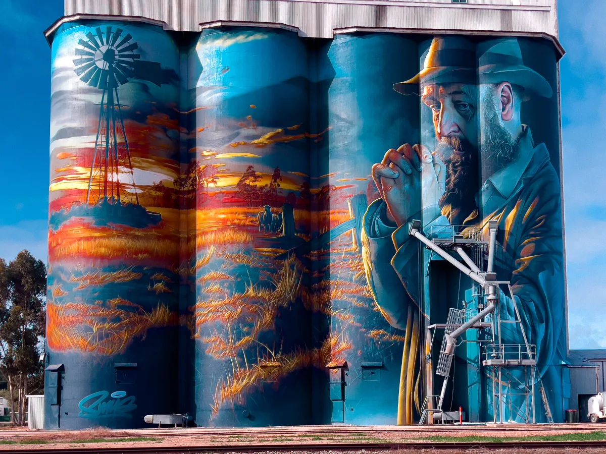 The Lameroo silo art, created by Smug, showcases a Mallee farmer as a monument to resilience and hope.