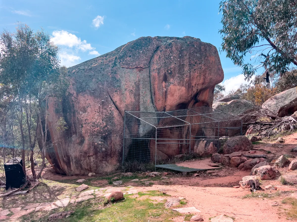 A large boulder at the Stawell heritage rock site protects ancient Aboriginal rock art.