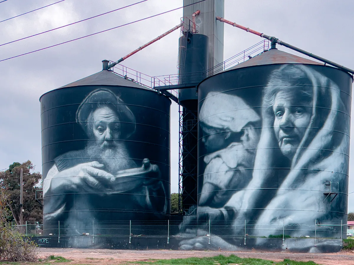 The silo art in St Arnaud, though skillfully executed, only accentuates the town's dreary atmosphere with its black and white color scheme.