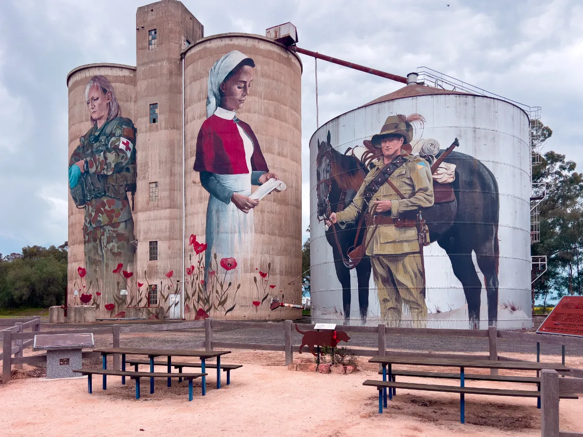 The Devenish silo art installation featuring a medic, a nurse, and a light horseman, a powerful tribute to Australian service and sacrifice.