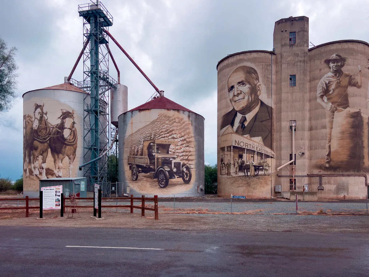 The silo art at St James tells the story of George Coles Snr and the founding of Coles supermarkets.