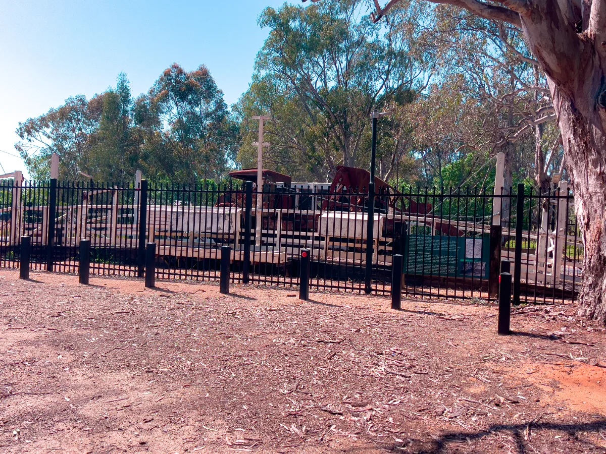 Fenced for posterity, an old truck sits on the Barmah punt, representing how important the Murray River was to the region.