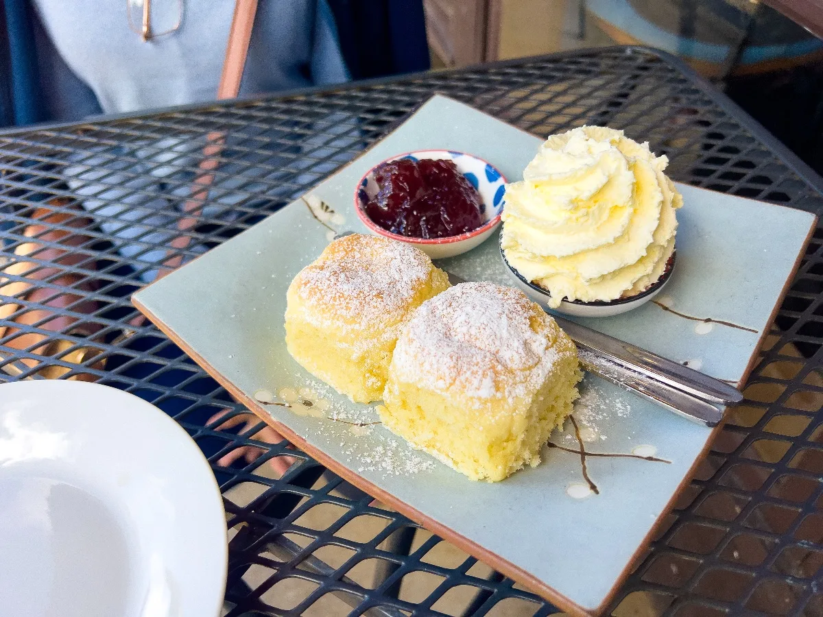Scones, jam, and cream – a trifecta of deliciousness to start the day.