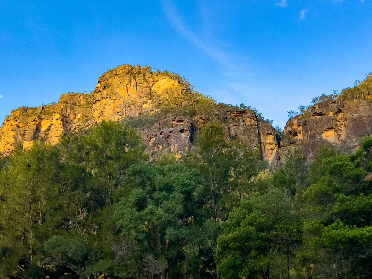 Even as the sun dipped lower, the golden glow on the escarpment reminded us of nature's artistry.