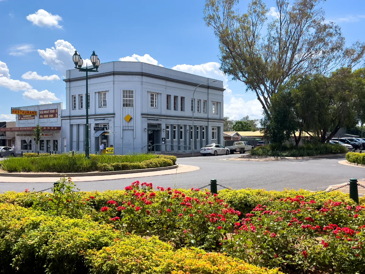 A well-maintained roundabout near the Commonwealth Bank adds to the pleasant townscape of Forbes.