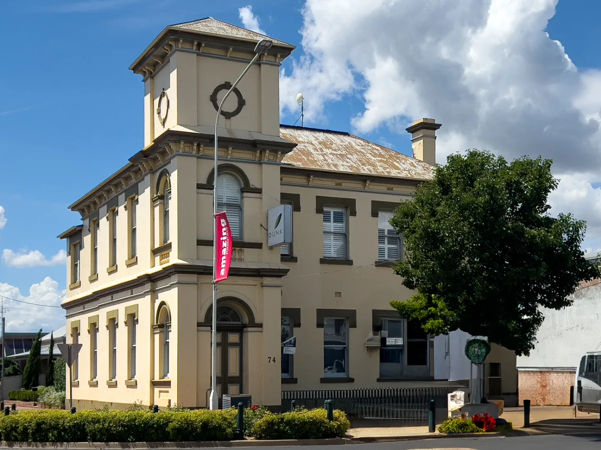 The historic Dunk building in Forbes, its grandeur a testament to the town's past.