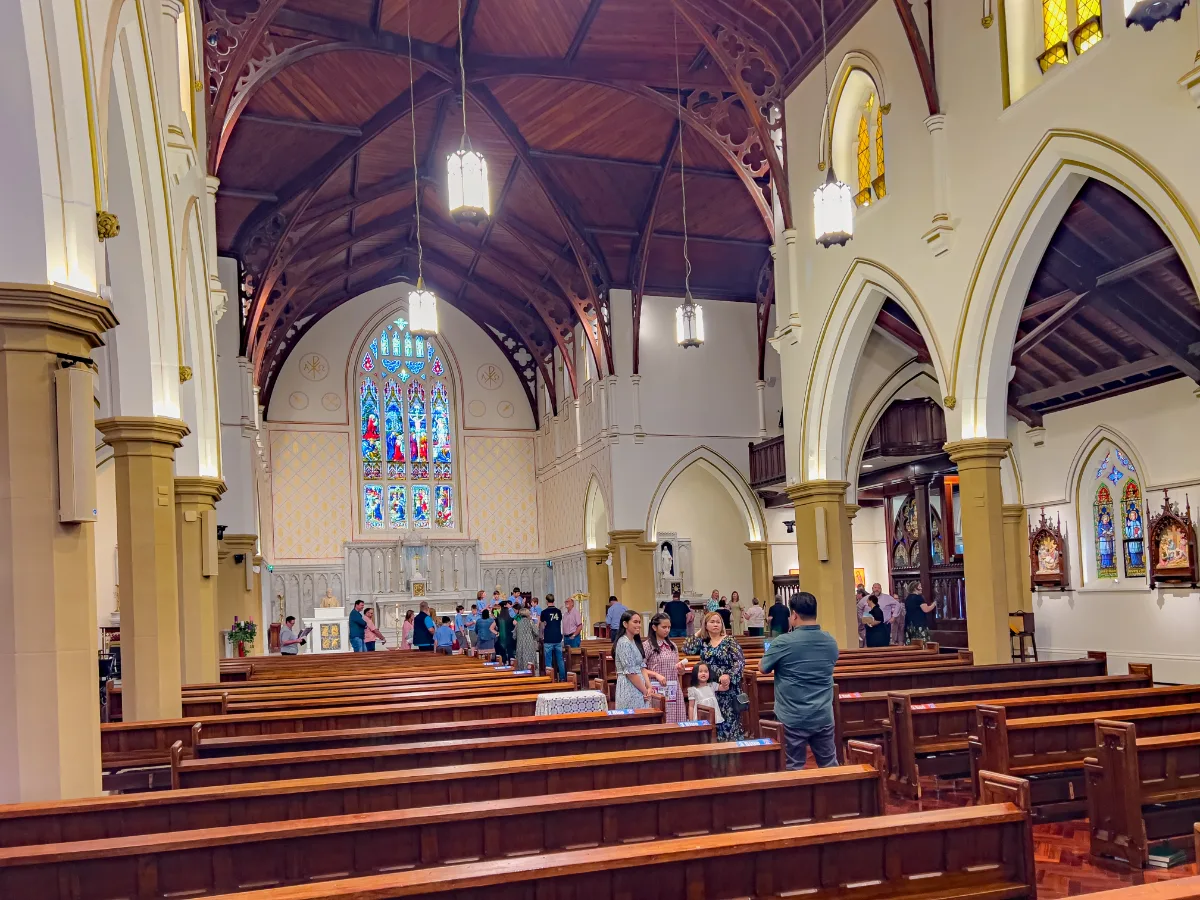 Parishioners gather inside St. Saviour's Cathedral.
