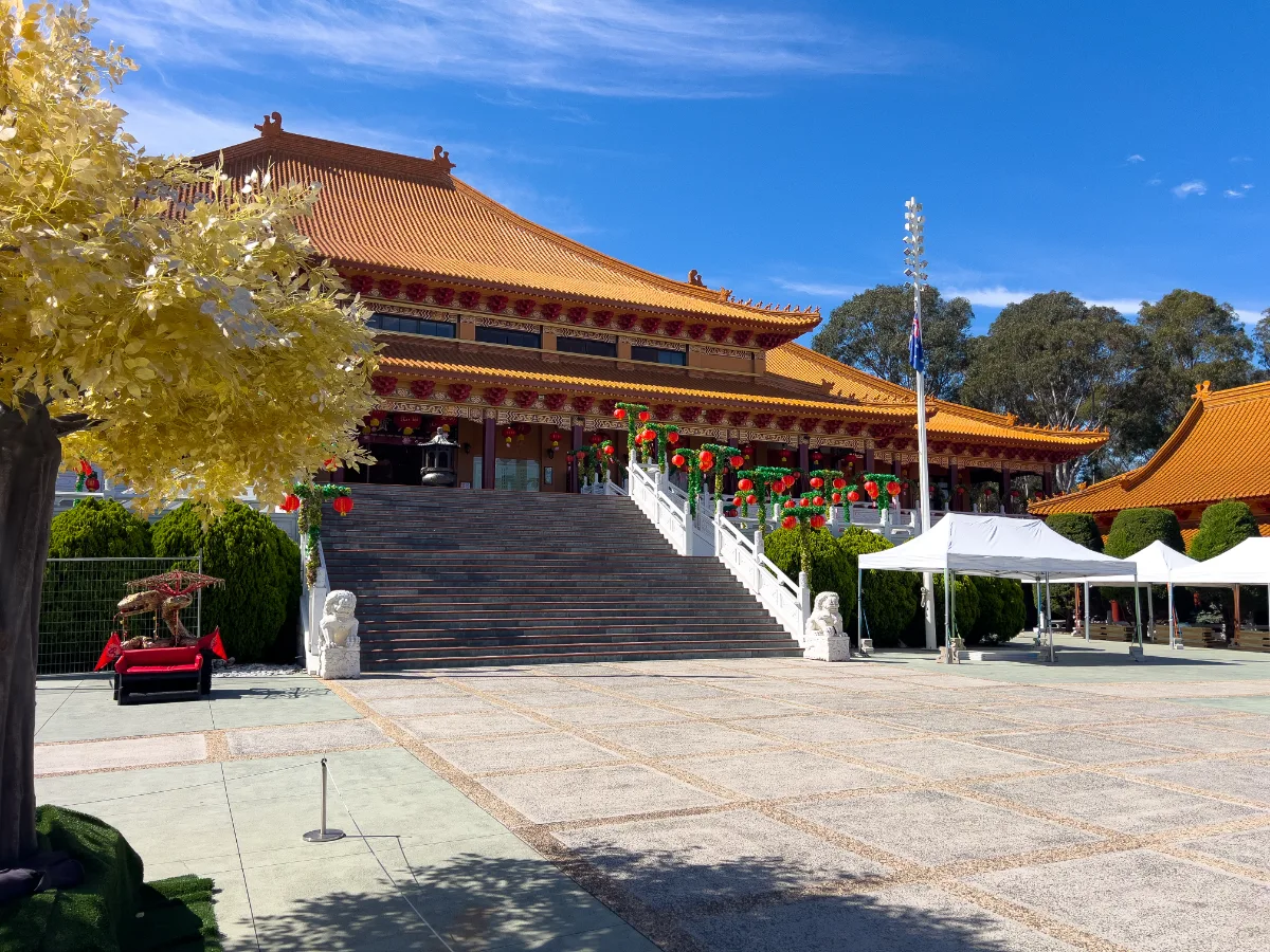 The temple's striking architecture against a clear blue sky.