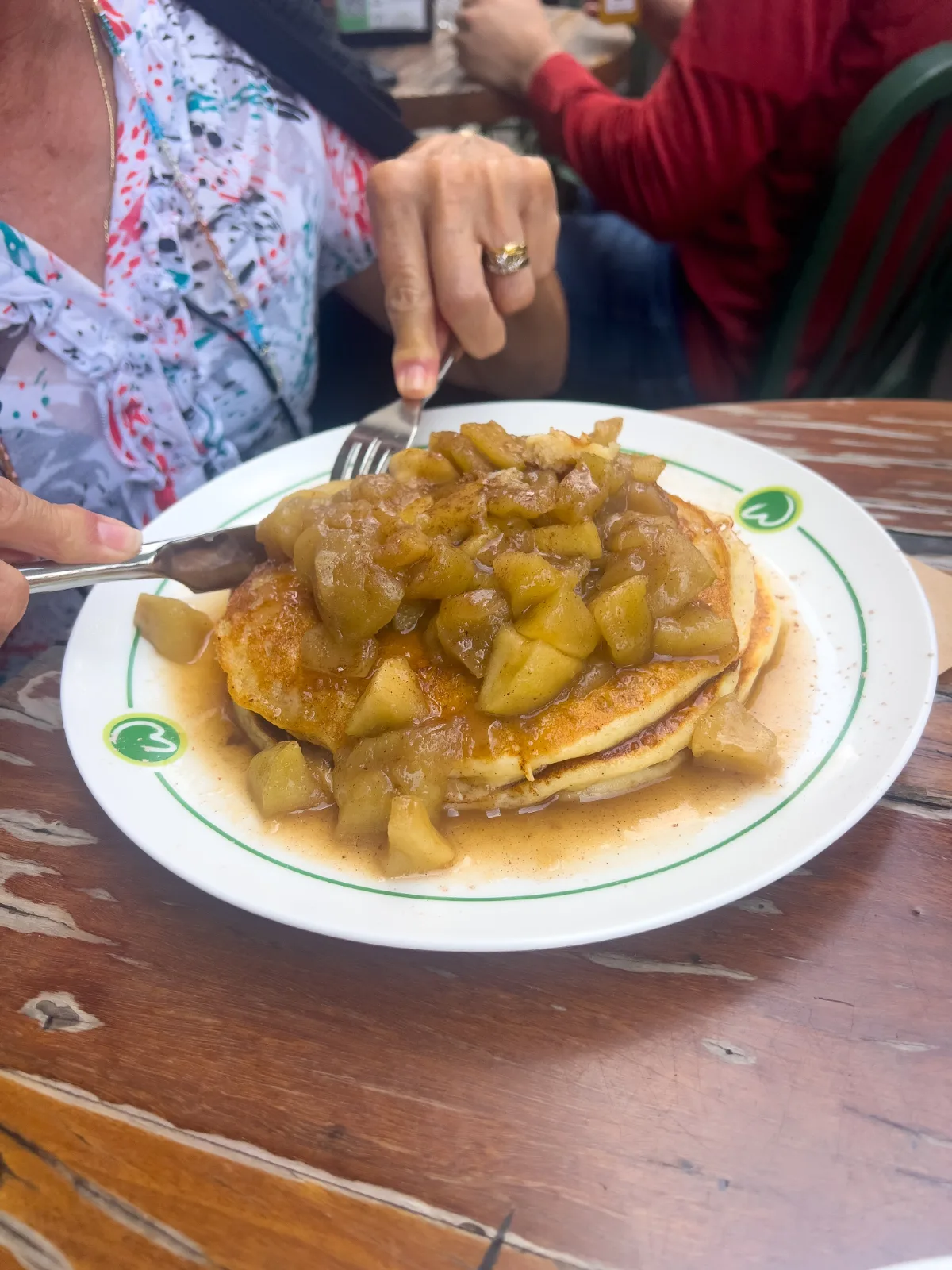 Pancakes with apple topping—a delightful start to the day.