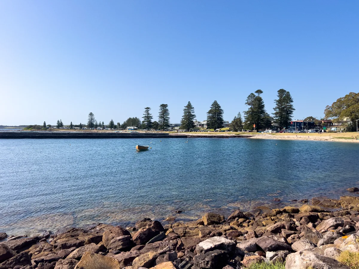 A tranquil harbor scene in Shellharbour, New South Wales, offering a peaceful rest stop on our travels.