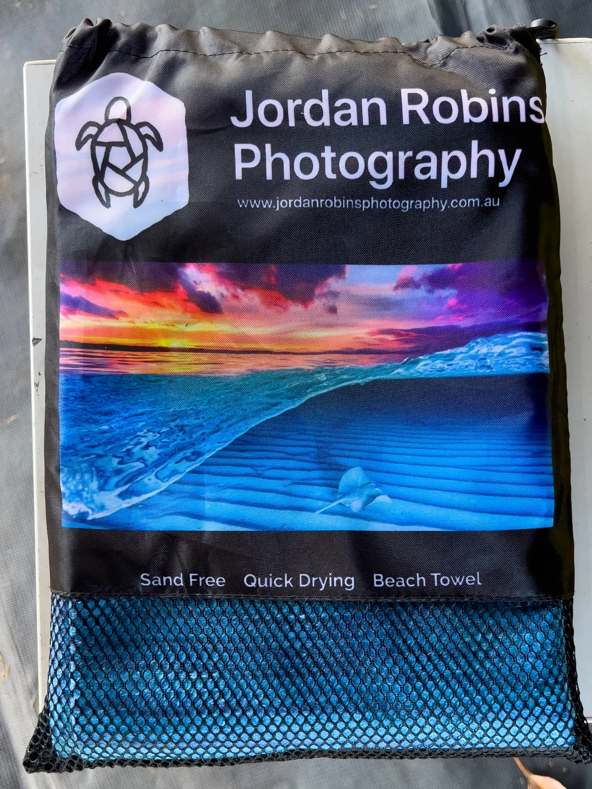 Our new sand-free beach towel, purchased at the Berry Showgrounds Markets.