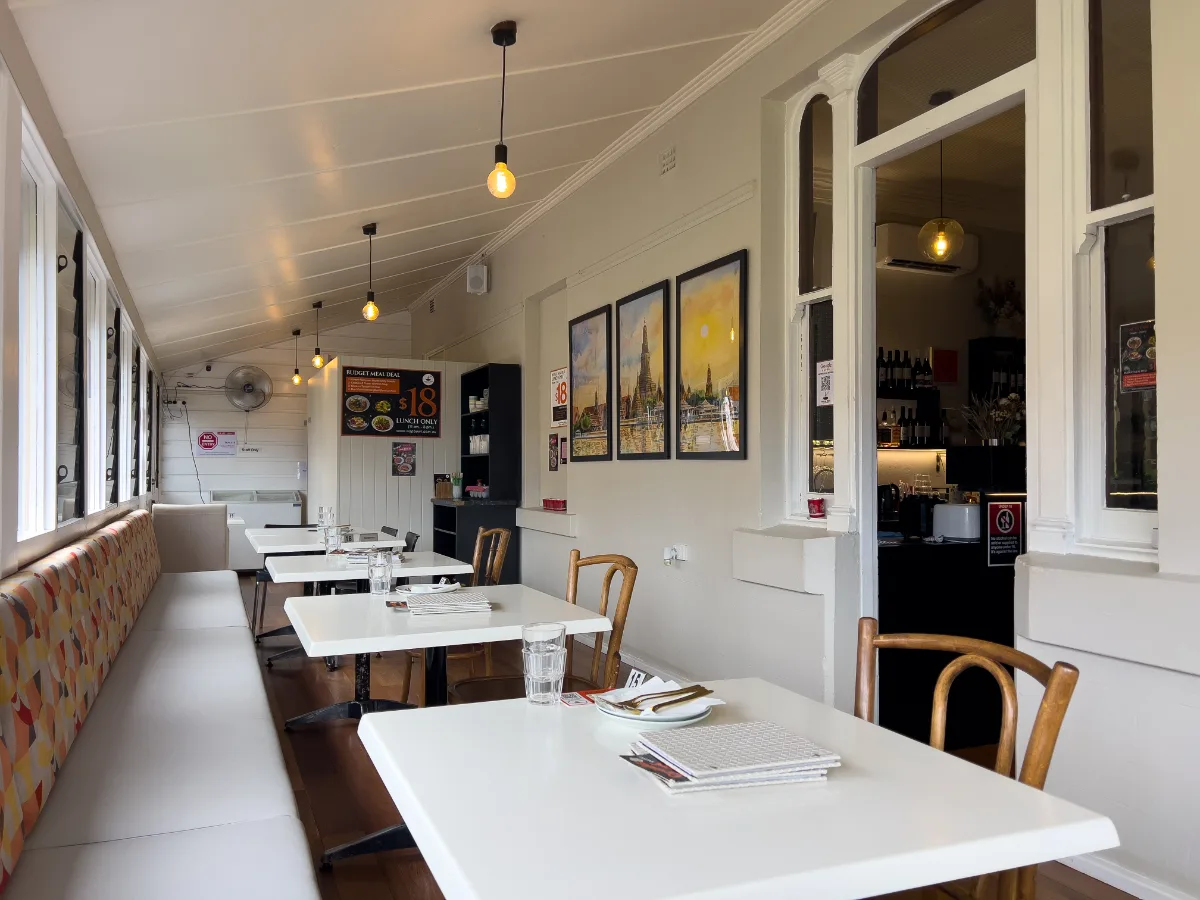 The restaurant interior is bright, airy, and welcoming.