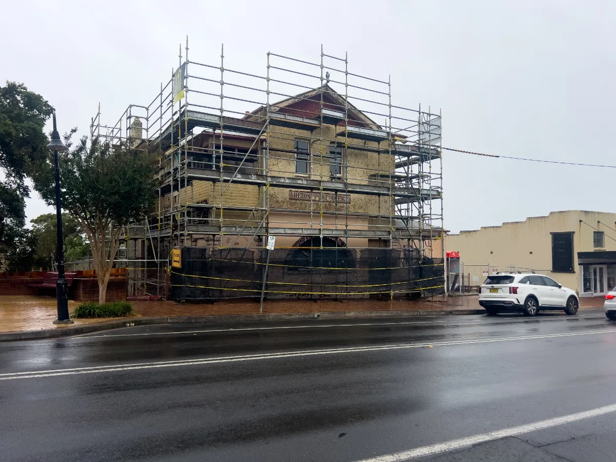 An old building undergoing careful renovations, highlighting the ongoing efforts to preserve Milton's rich heritage.