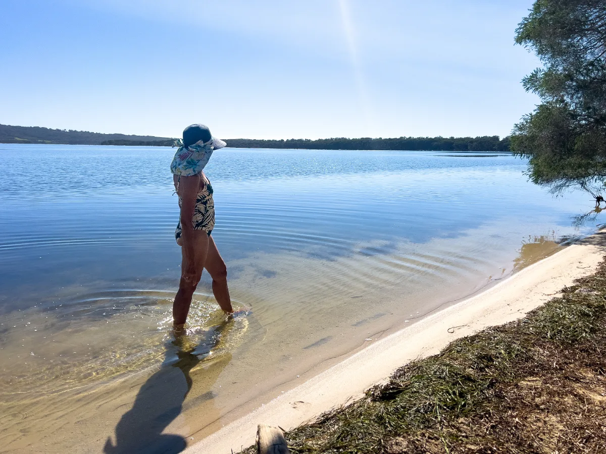 Testing the waters of Bournda Lagoon on a warm summer afternoon.