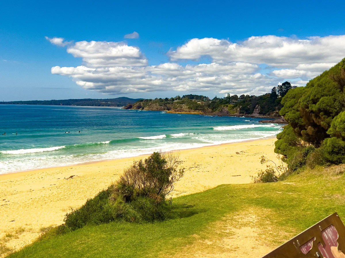 The serene beauty of Eden's coastline, a perfect blend of golden sand and azure waters.