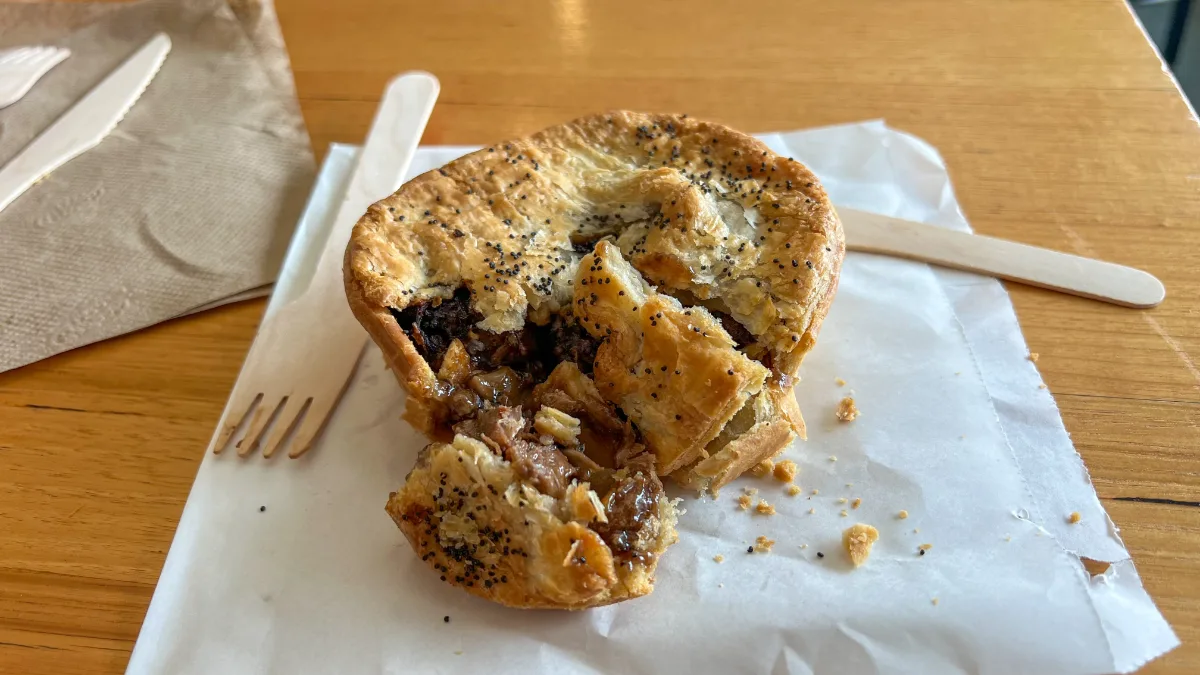 A savoury meat pie, a classic Australian indulgence.