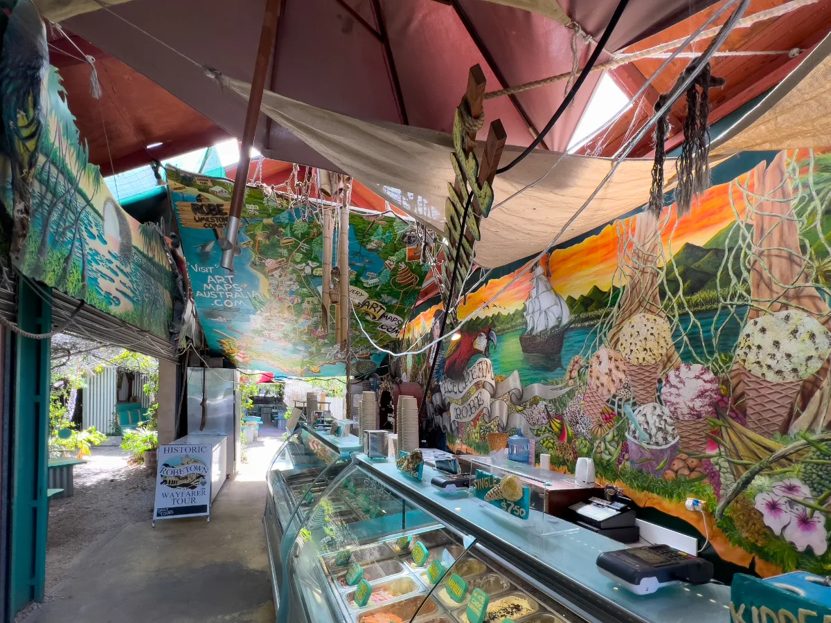 Inside the ice cream shop, the colorful murals and exotic flavors created a feast for the senses.