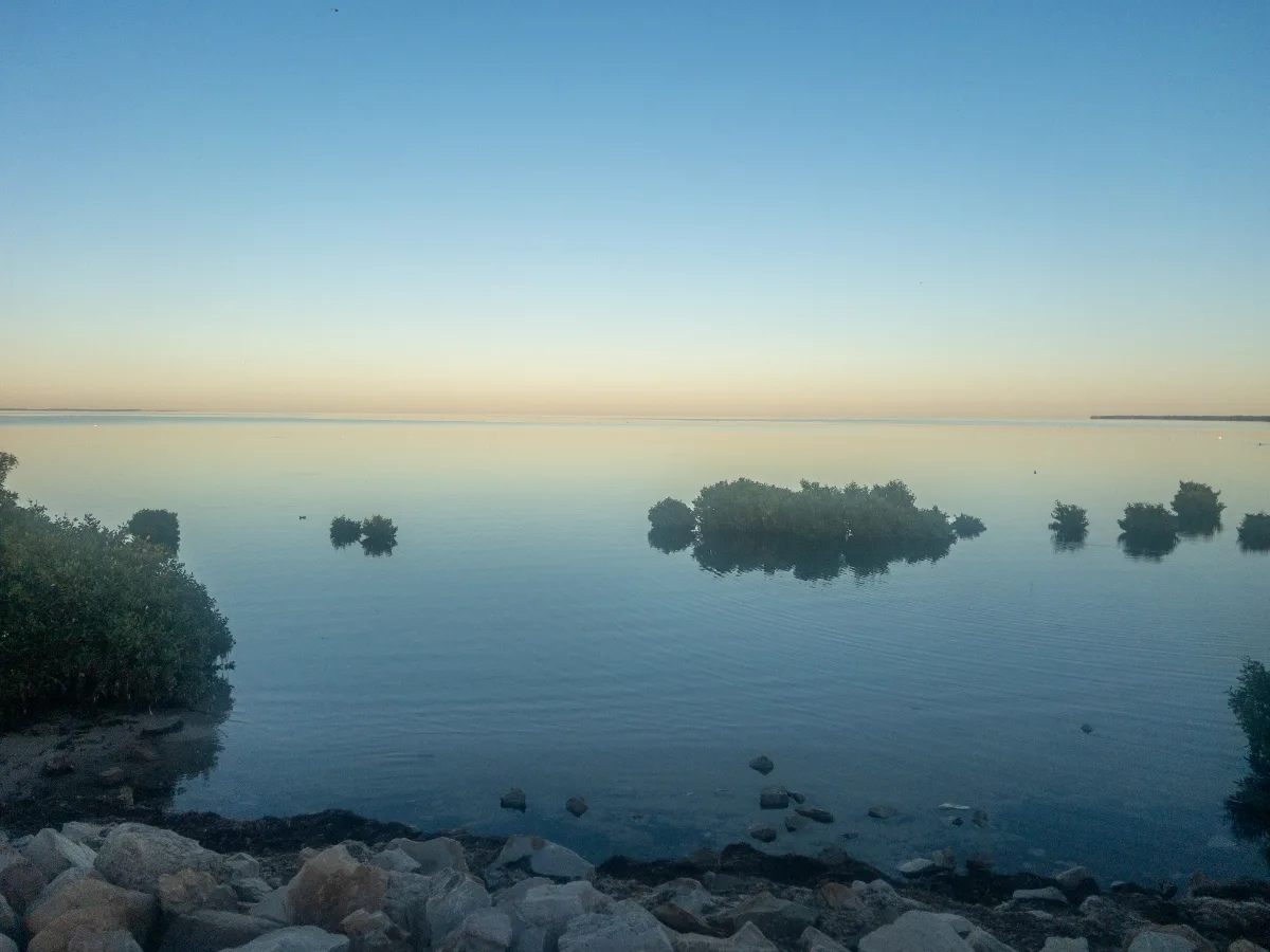 The tranquil waters of St Kilda at dawn, a far cry from the bustling city nearby.