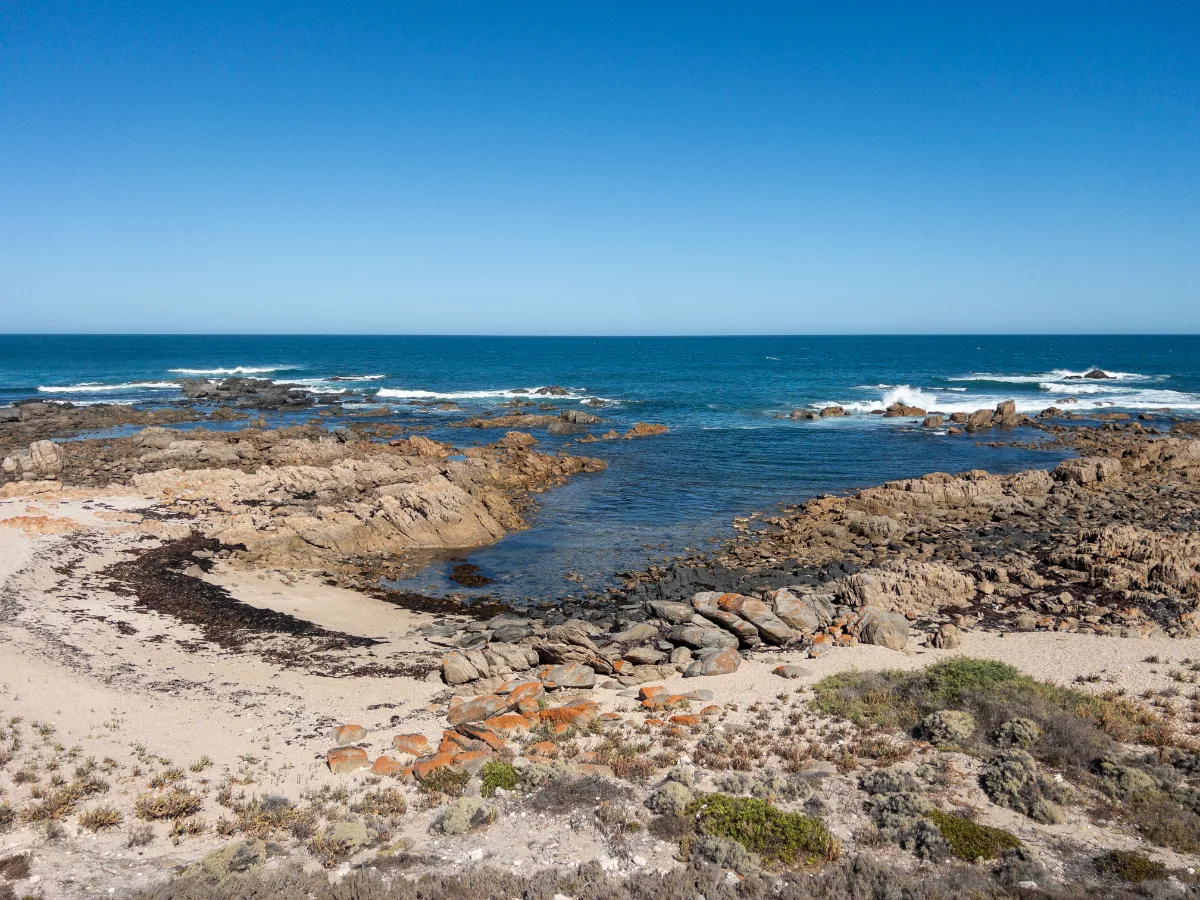 The rocky coastline of Corny Point, where the Southern Ocean relentlessly pounds the shore.