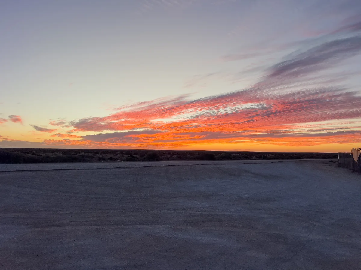 Sunset over the Nullarbor Plain. It was more than just a sunset; it was a symphony of light and color.