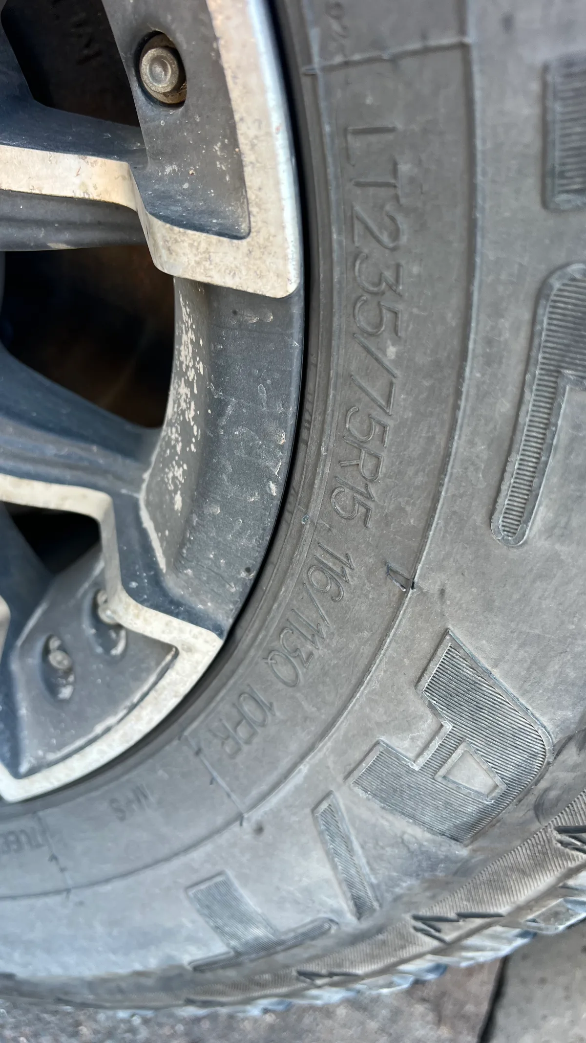 The size of one of the caravan's new tyres, now safely installed in West Kalgoorlie.