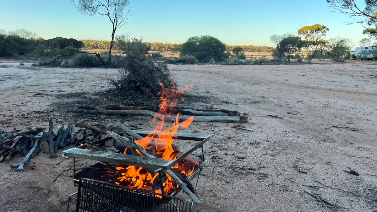 The quintessential Aussie campfire scene. A simple pleasure under the vast outback sky.
