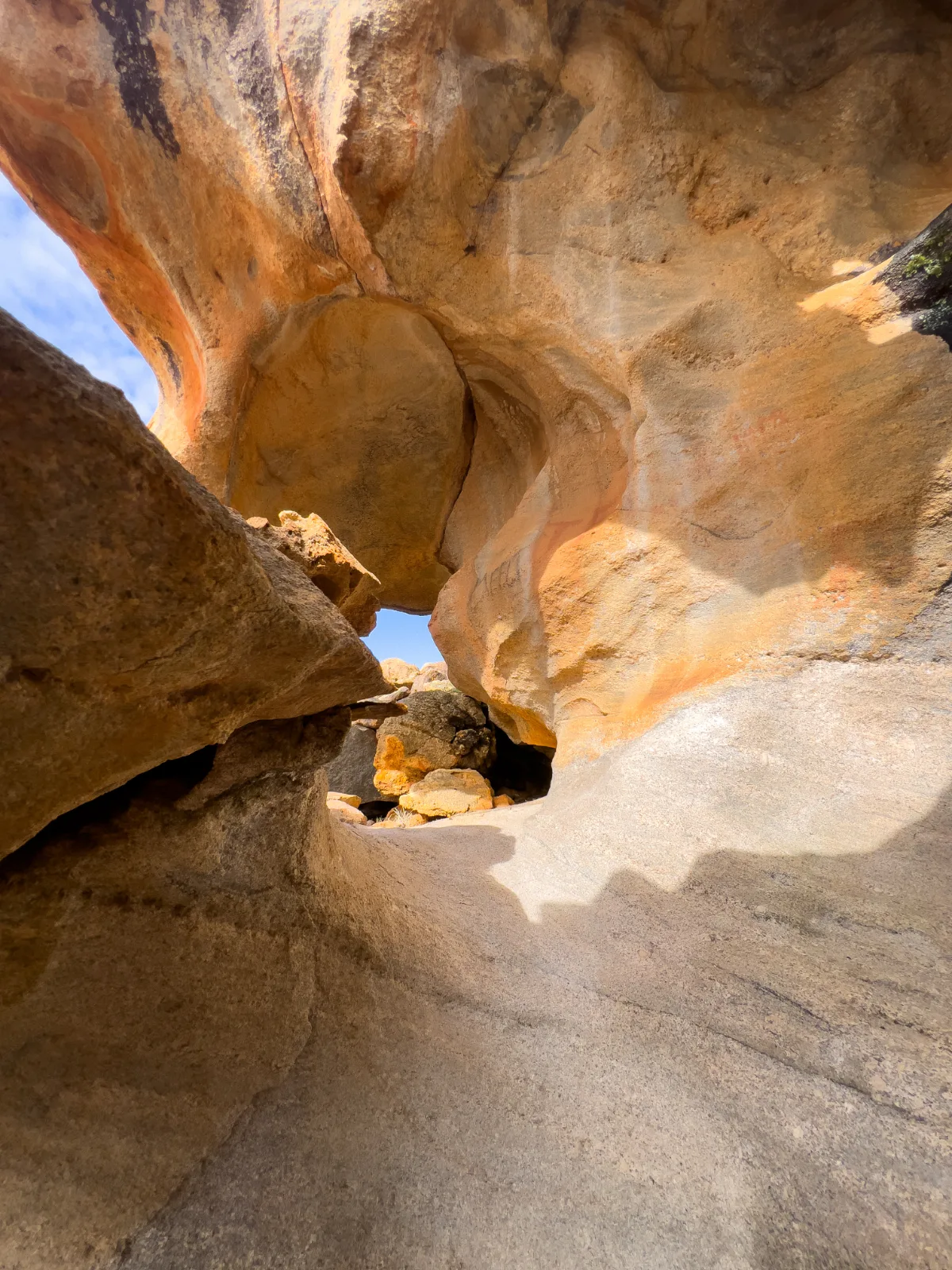 Natural arches and formations within the rock offer unique perspectives.