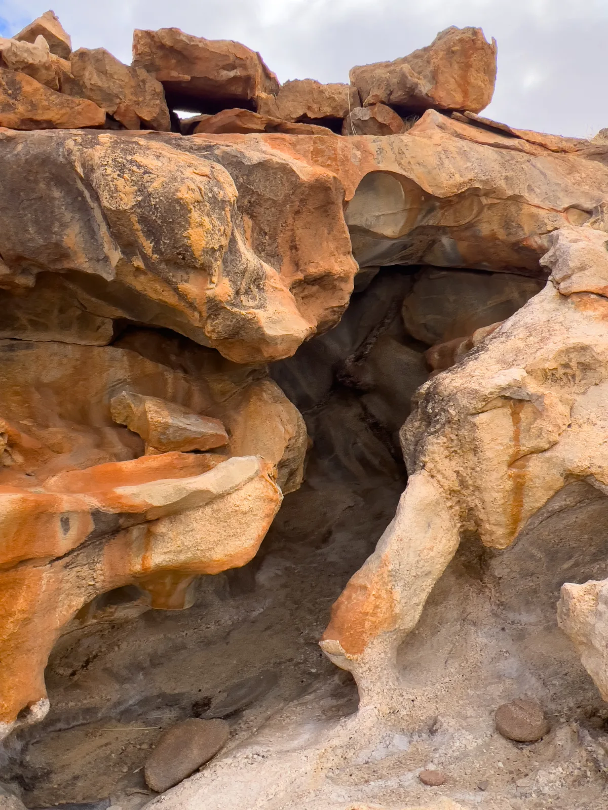 Close-up view of the intricate textures and patterns etched into the rock face.