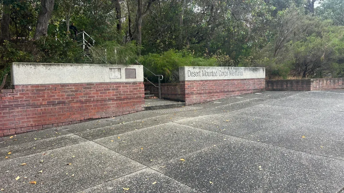The entrance to the Desert Mounted Corps Memorial, blending in with the surrounding landscape.