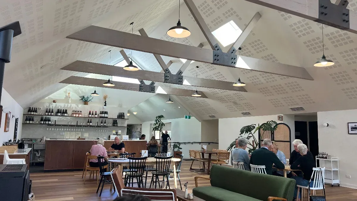 The spacious and inviting interior of Mrs. Jones restaurant, retaining the original architecture of the old butter factory.