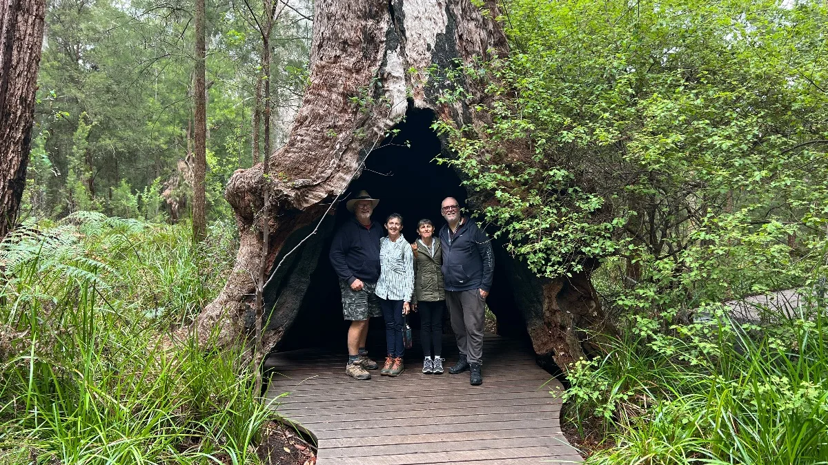Us and some friendly strangers nestled inside the base of a massive, fire-hollowed Tingle tree. A truly unique photo opportunity!